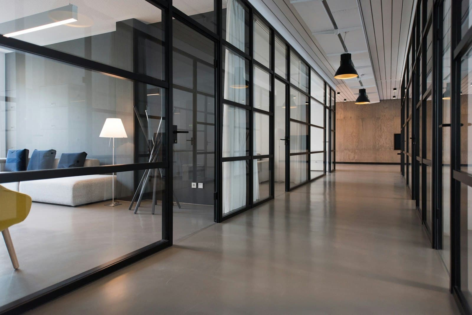 A quiet corridor with glass offices